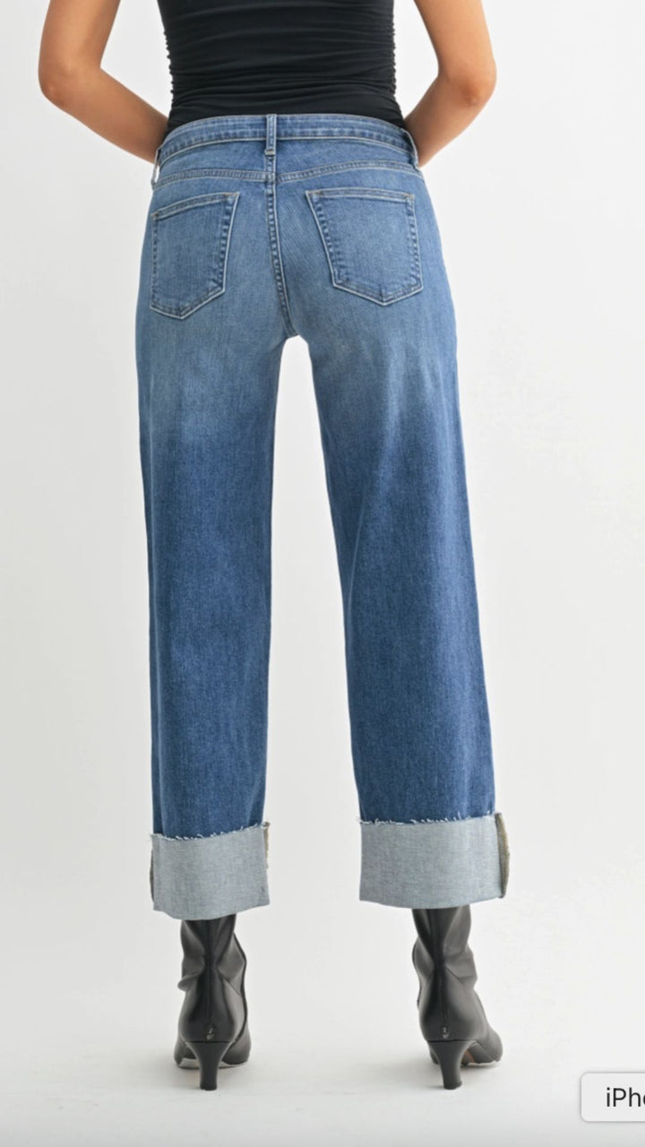 Mid Rise Medium Wash Scissor Cut Cuffed Slim Wide Leg Jeans