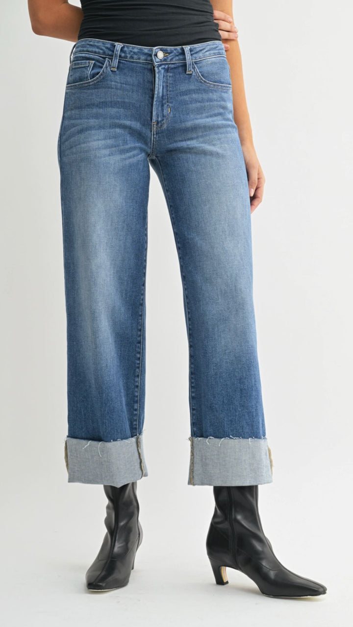 Mid Rise Medium Wash Scissor Cut Cuffed Slim Wide Leg Jeans