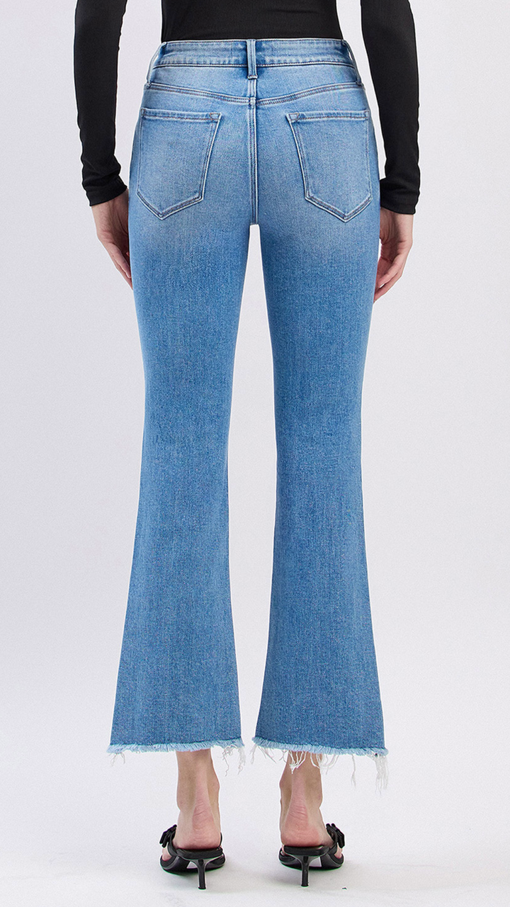 High Rise Light Wash Slant Raw Hem Crop Flare Jeans