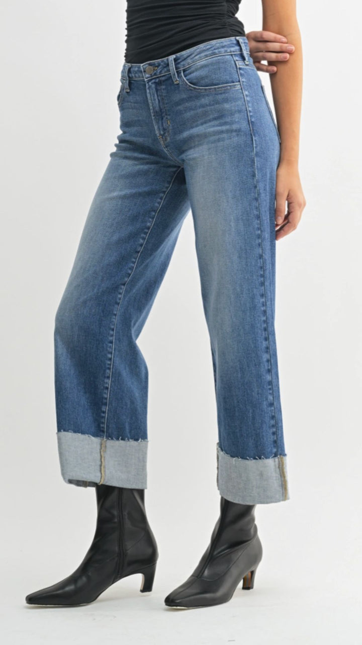 Mid Rise Medium Wash Scissor Cut Cuffed Slim Wide Leg Jeans