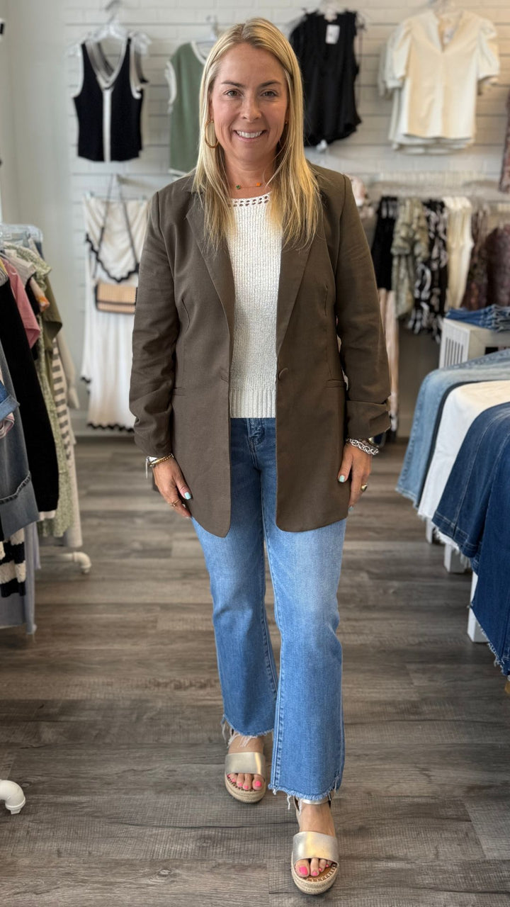 High Rise Light Wash Slant Raw Hem Crop Flare Jeans