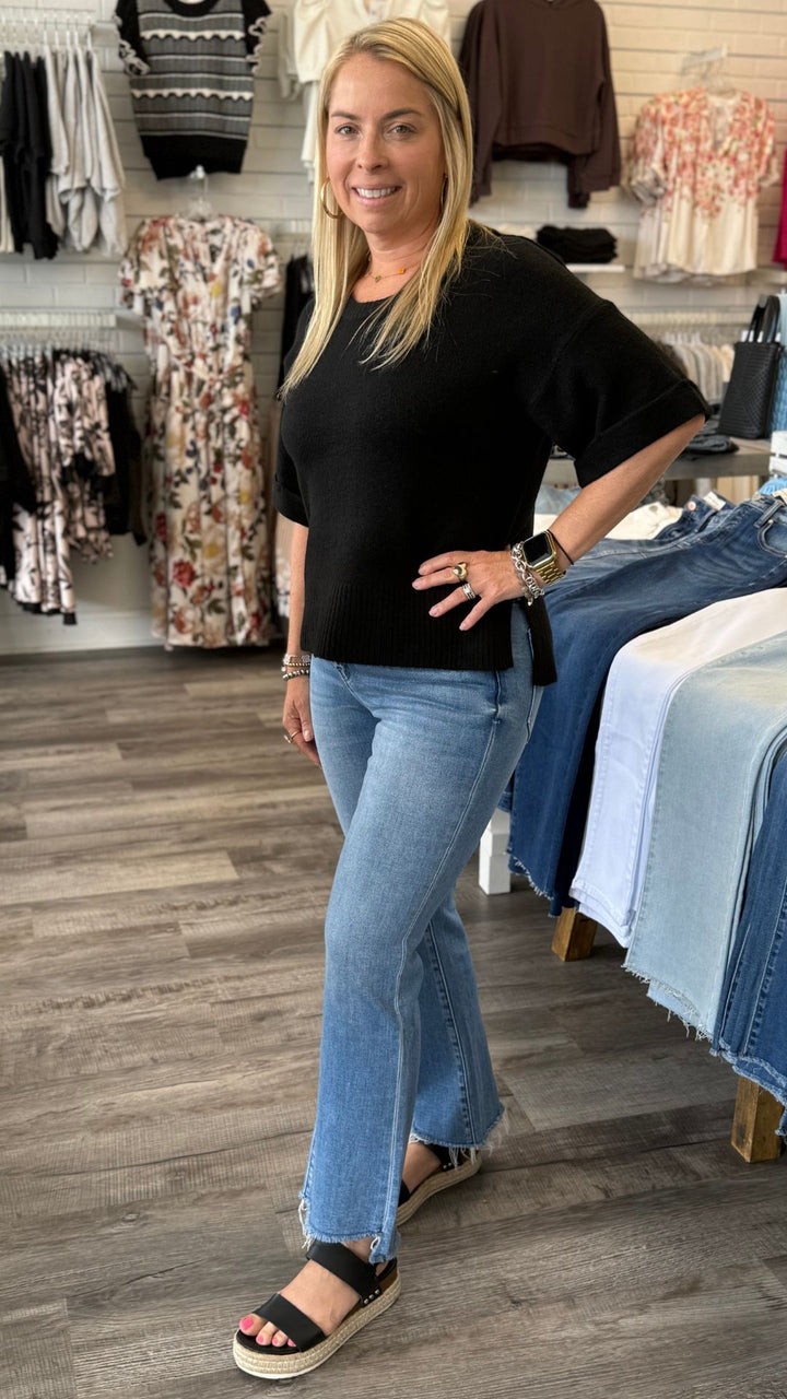 High Rise Light Wash Slant Raw Hem Crop Flare Jeans