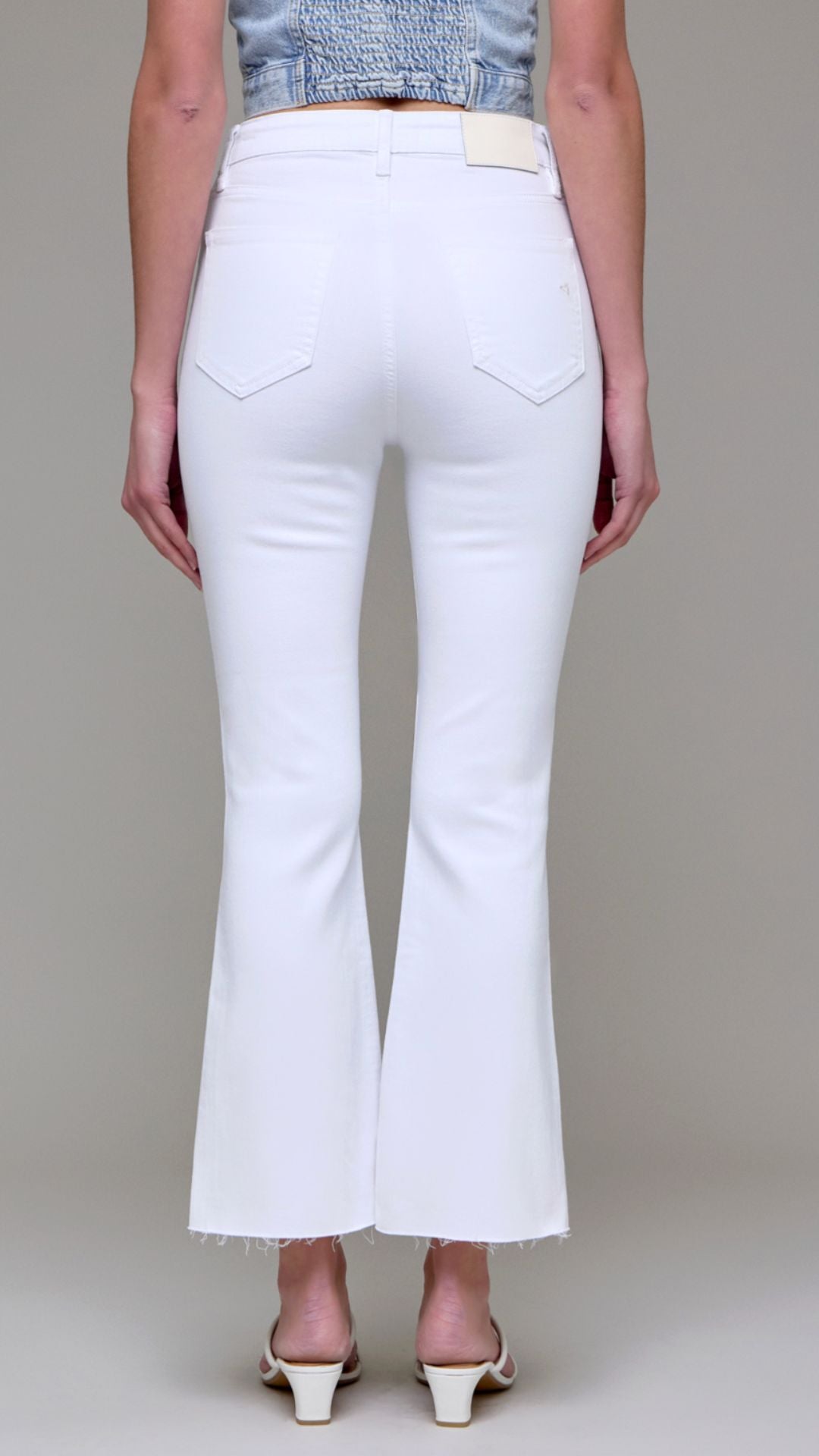 High Rise White Step Hem Cropped Flare Jeans
