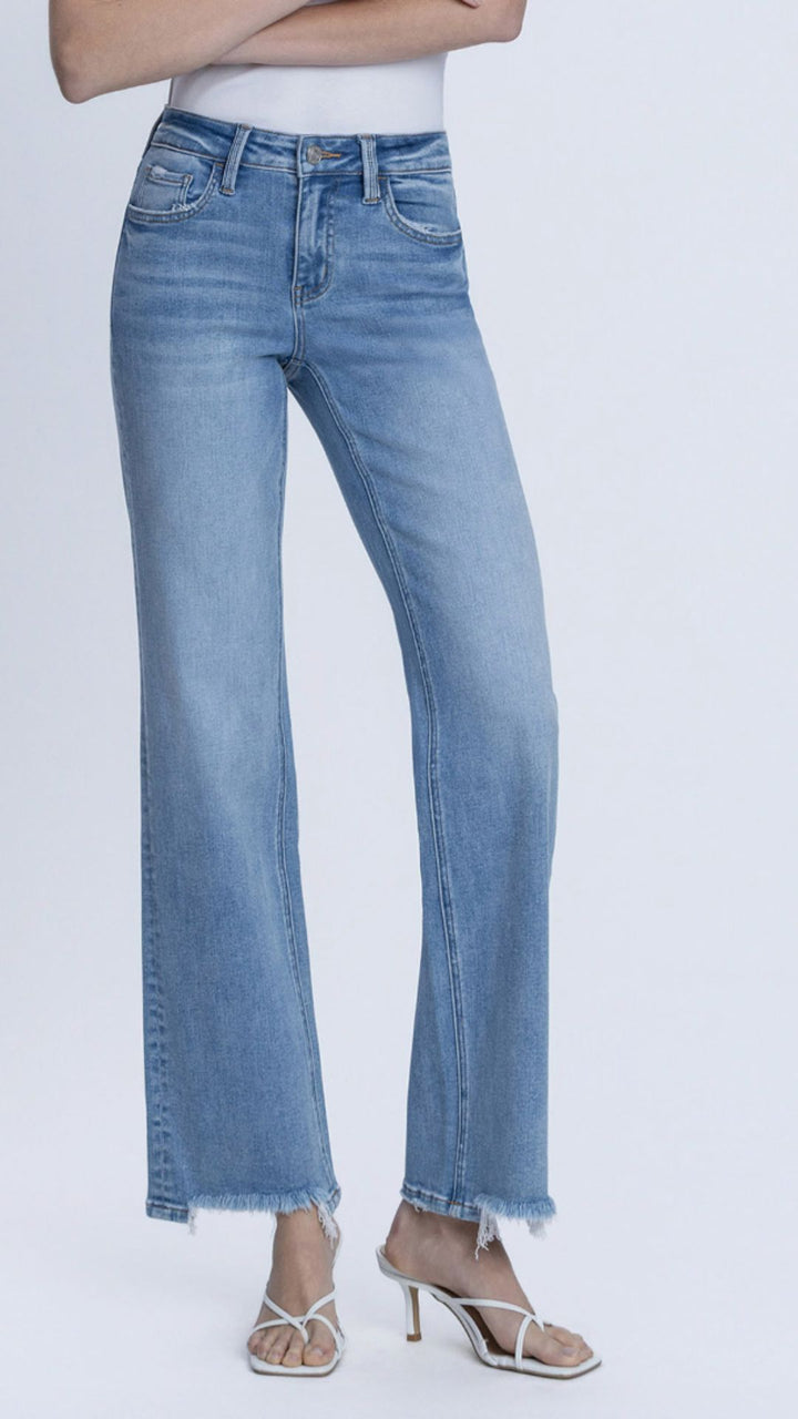 Mid Rise Medium Wash Full Length Distressed Hem Slim Wide Leg Jeans