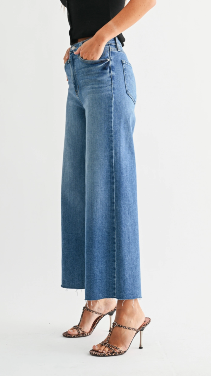 High Rise Medium Wash Scissor Cut Wide Leg Jeans