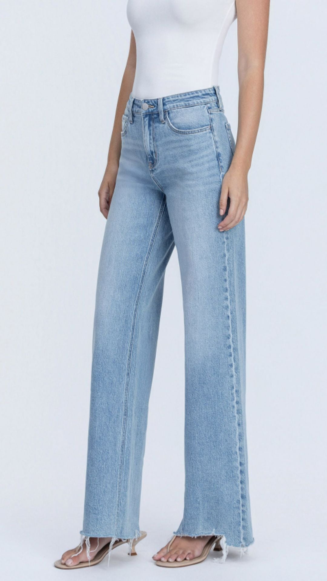 High Rise Light Wash Full Length Raw Hem Wide Leg Jeans