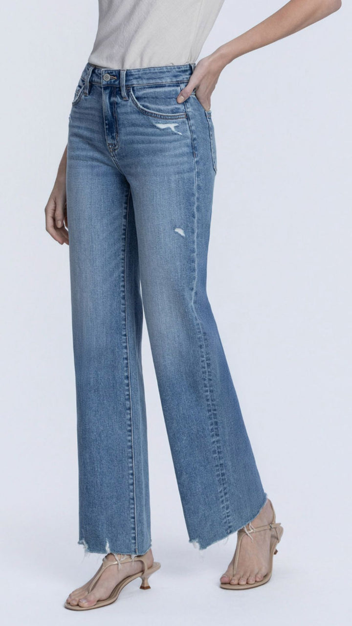 High Rise Medium Wash Full Length Slant Side Seam Vintage Flare Jeans