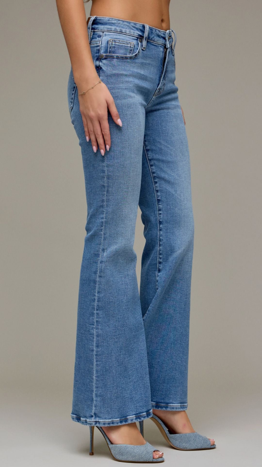 Mid Rise Medium Wash Full Length Flare Jeans