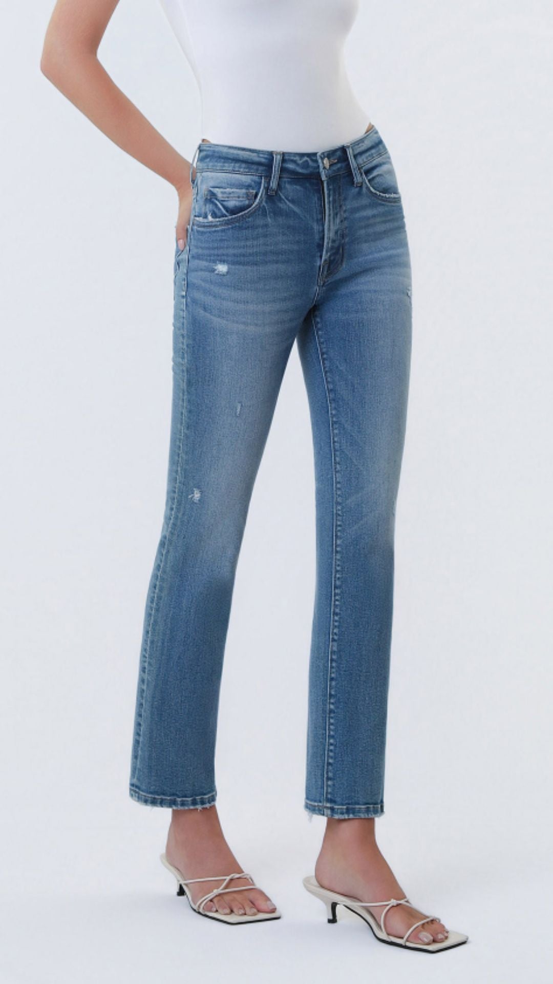 Mid Rise Medium Wash Ankle Slim Straight Slight Distressed Jeans