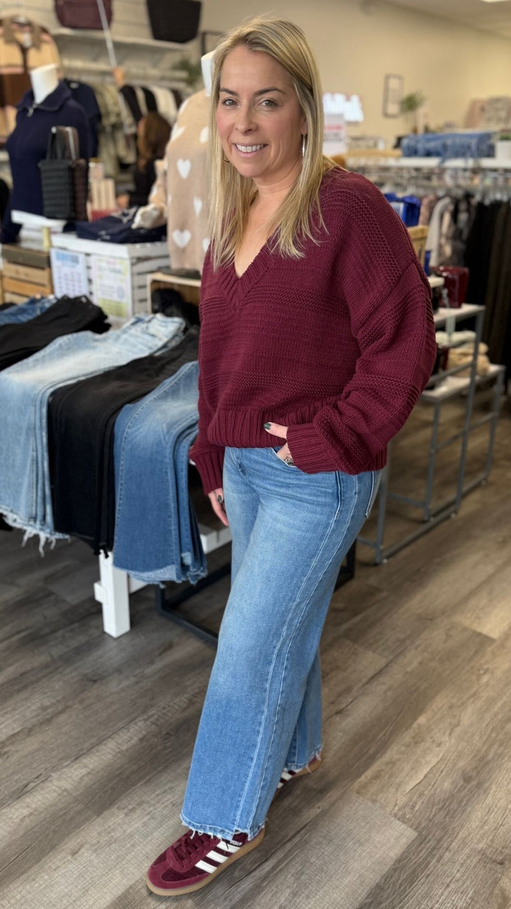 High Rise Medium Wash Side Panel Stem Hem Wide Leg Jeans