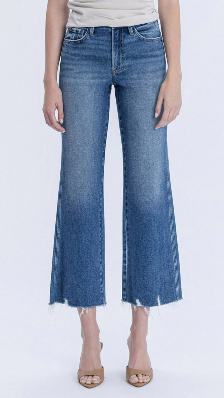 High Rise Medium Wash Raw Hem Vintage Flare Jeans