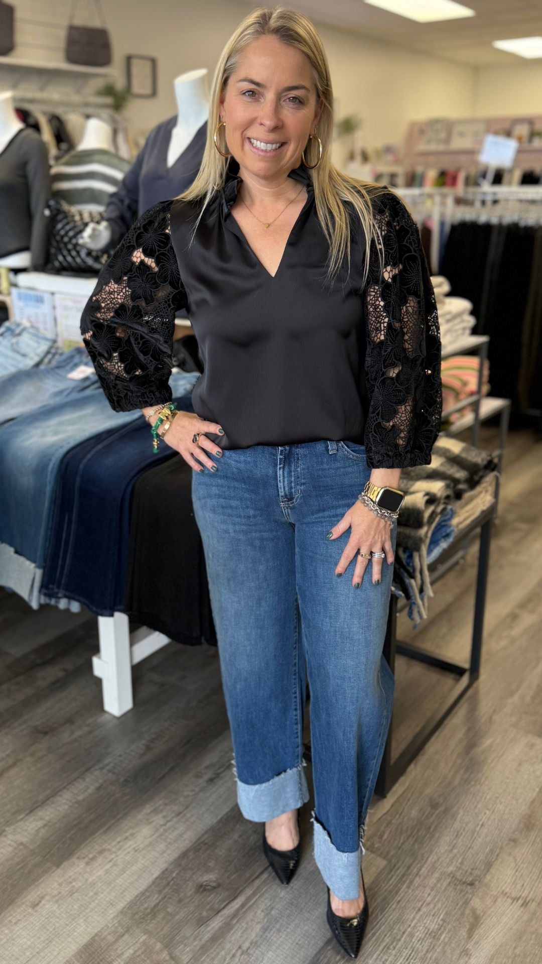 Mid Rise Medium Wash Scissor Cut Cuffed Slim Wide Leg Jeans