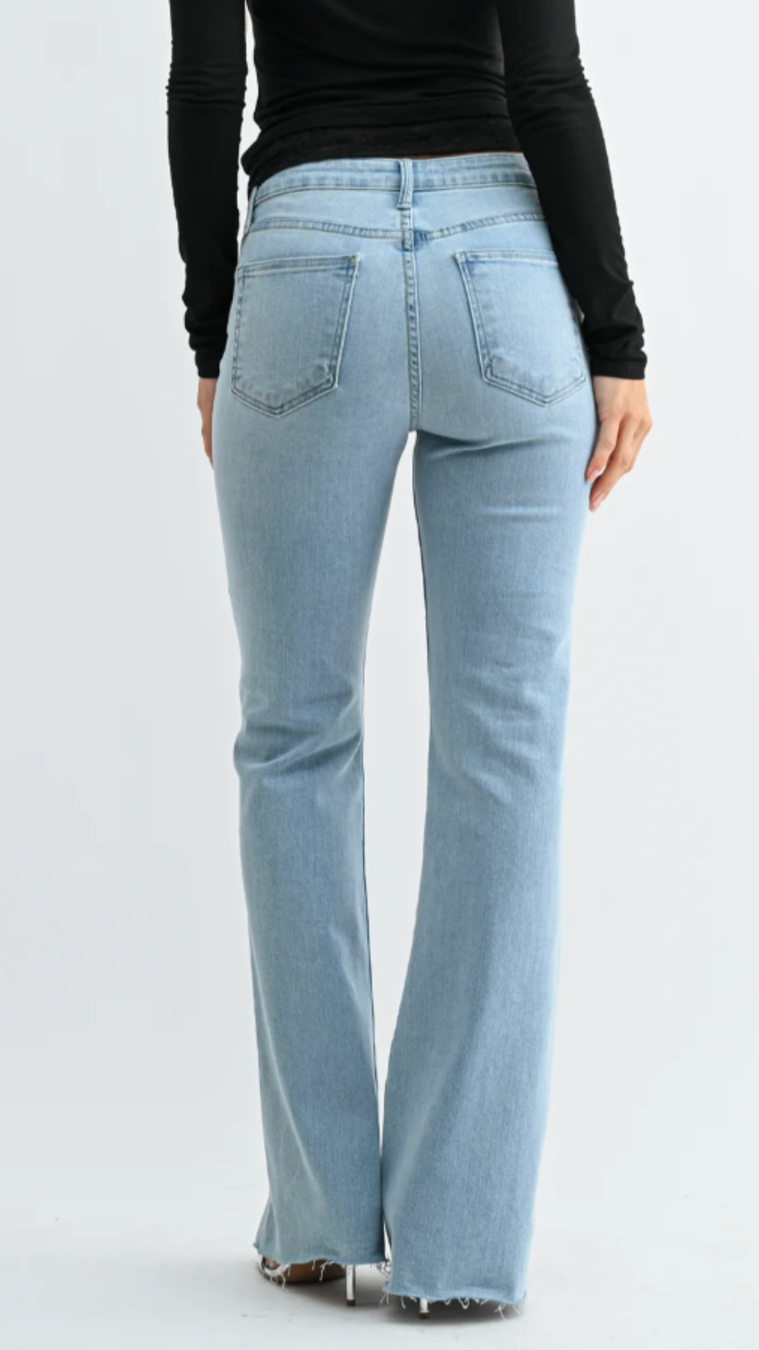 High Rise Light Wash Scissor Cut Full Length Flare Jeans