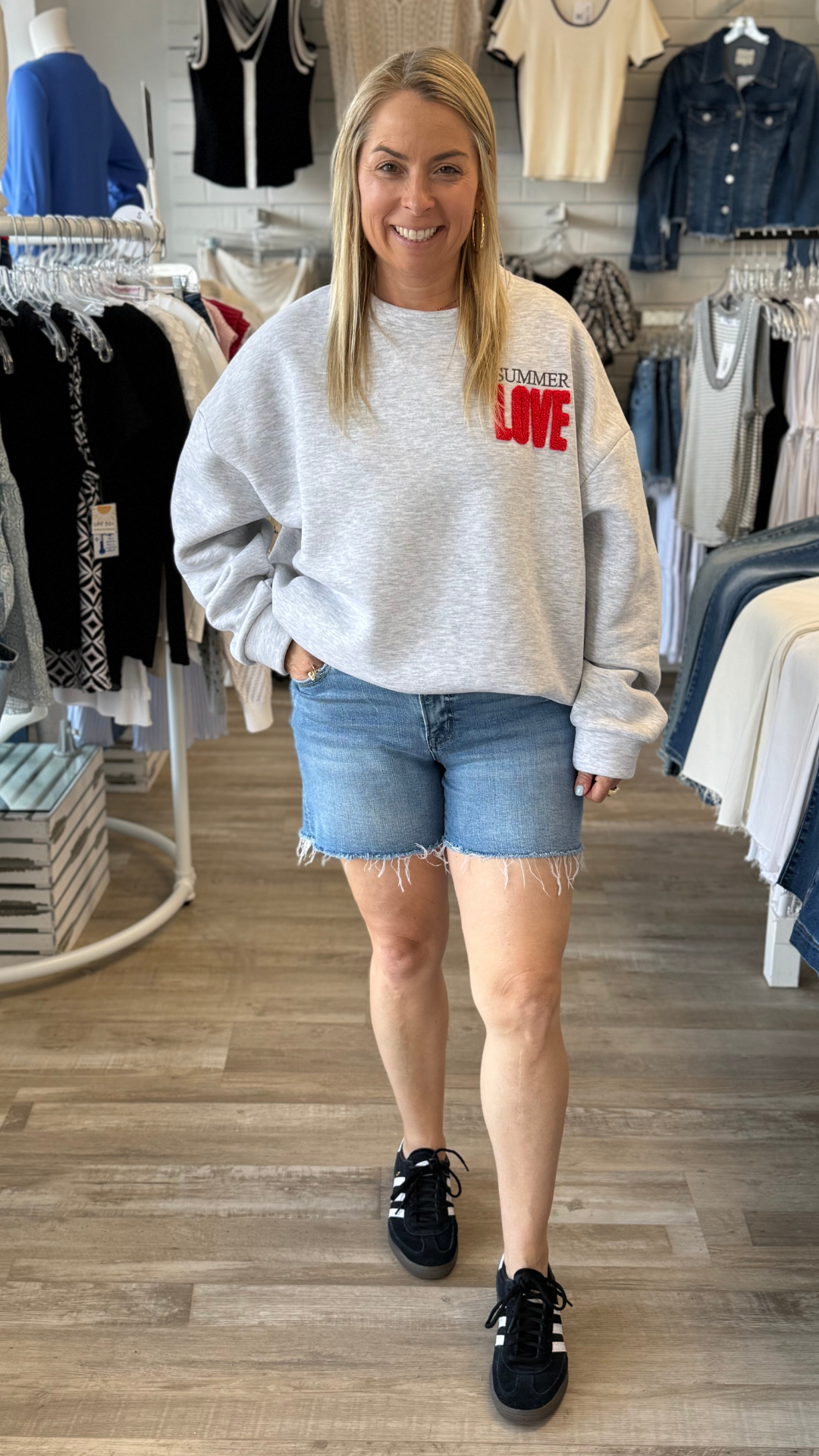 High Rise Medium Wash Raw Hem Denim Shorts