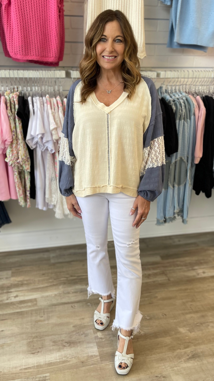 White Mid Rise Distressed Hem Ankle Bootcut Jeans